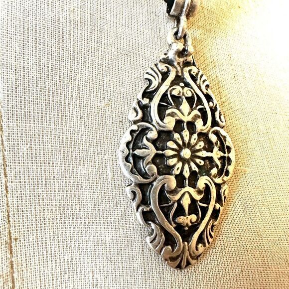 Silver tone pendant necklace on black cord - Picture 3 of 6